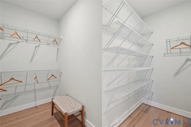 a view of an empty walk in closet