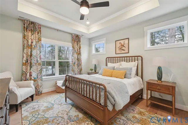 a bedroom with a bed and a couch