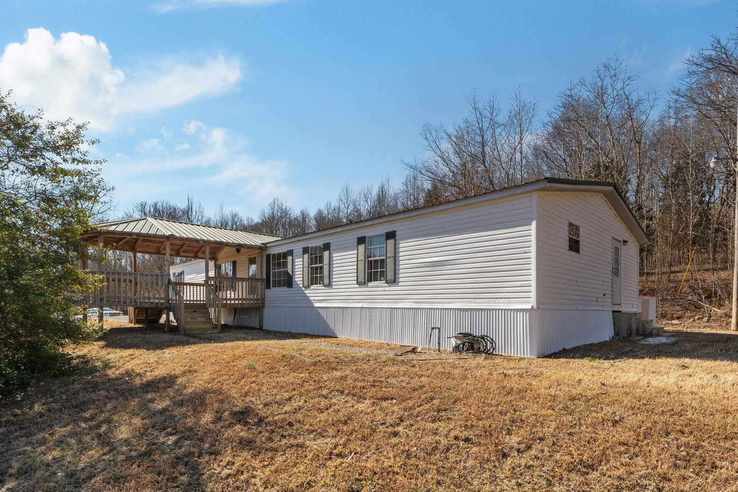 624 Nickletown Road Sugar Tree, TN 38380 - Photo 1 of 45 a front view of a house with a yard and garage