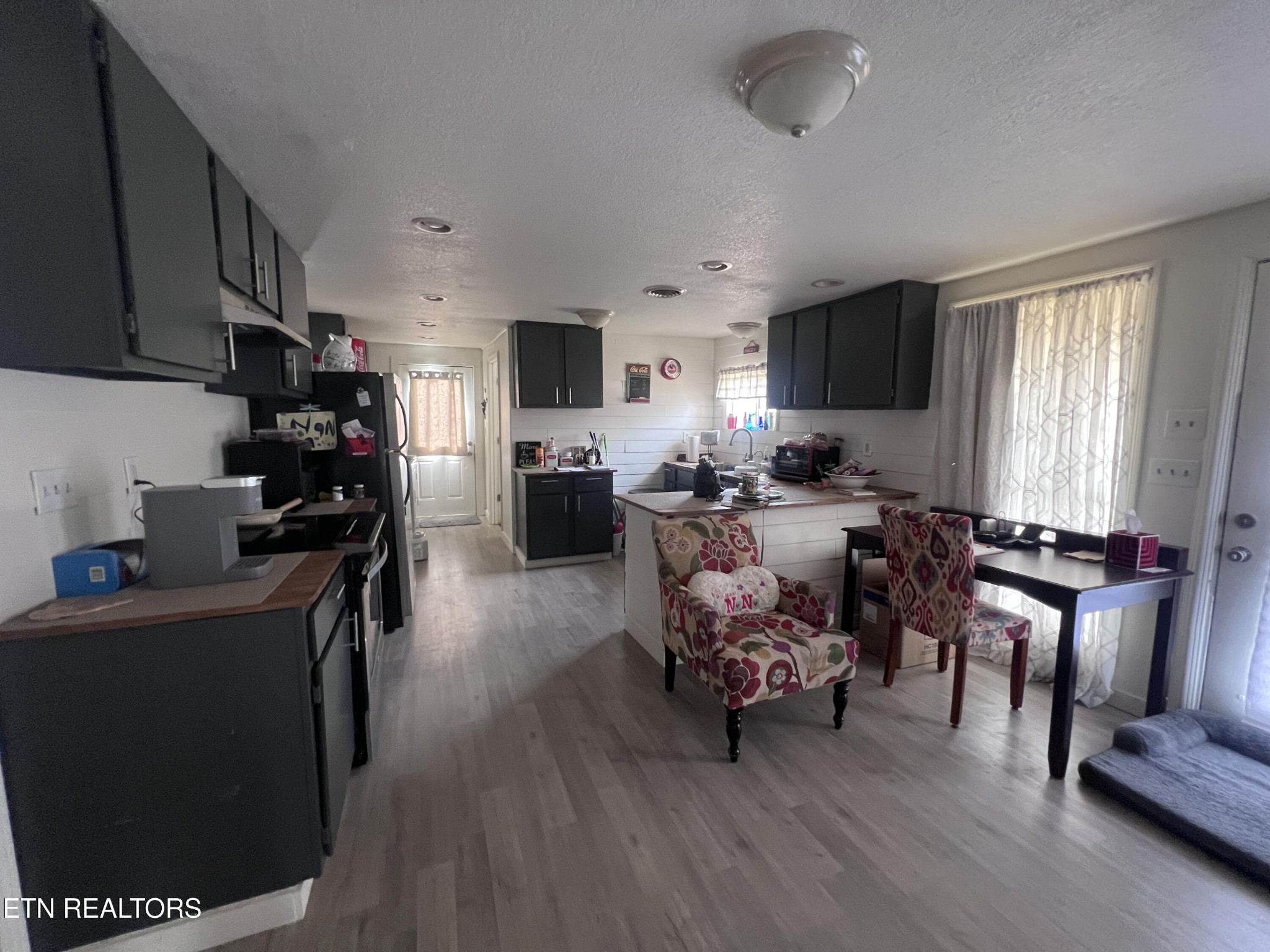 428 Patton Heights Circle Jamestown, TN 38556 - Photo 11 of 29 a living room with furniture flat screen tv and window