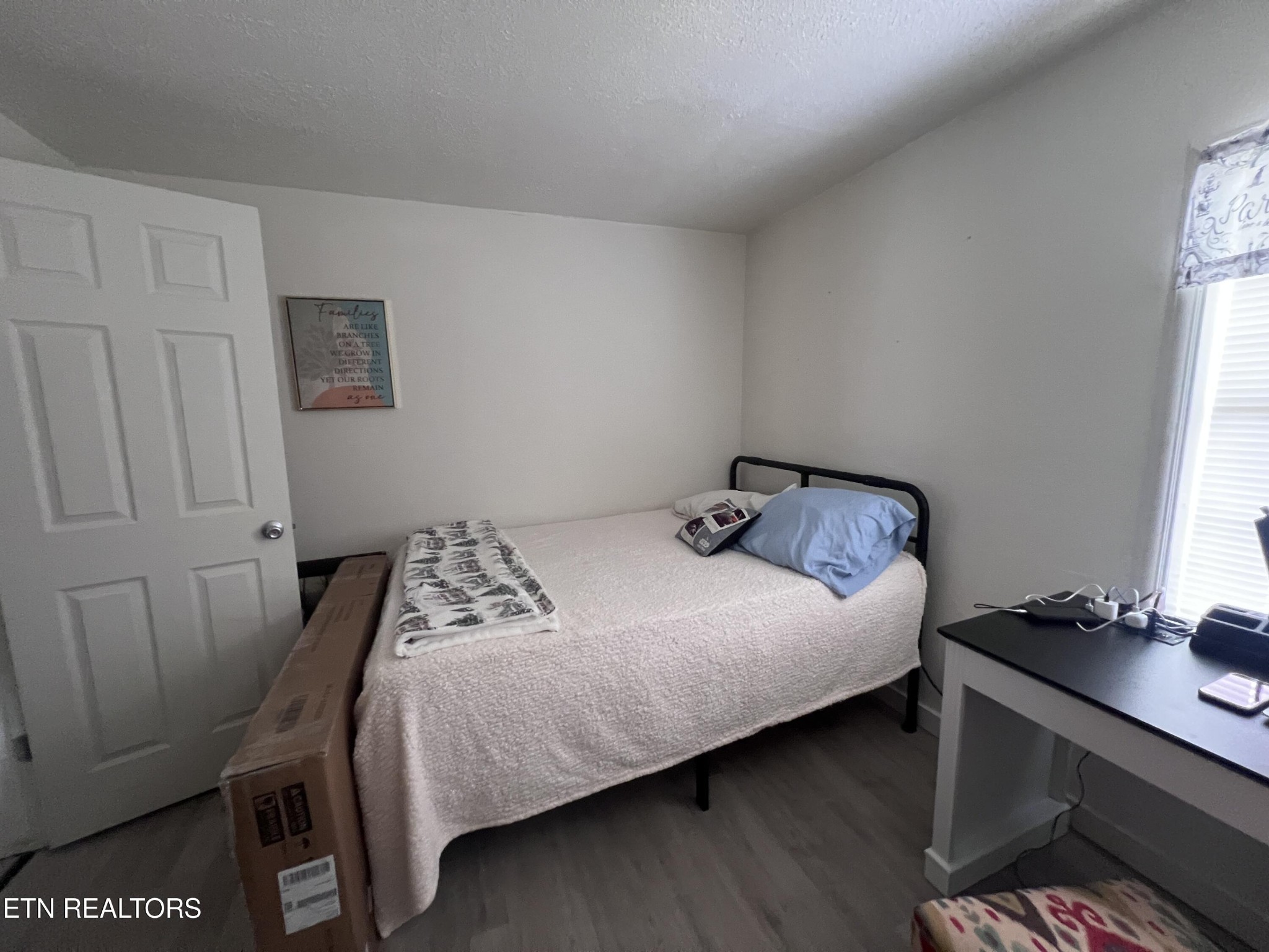 428 Patton Heights Circle Jamestown, TN 38556 - Photo 18 of 29 a bedroom with a bed and a window