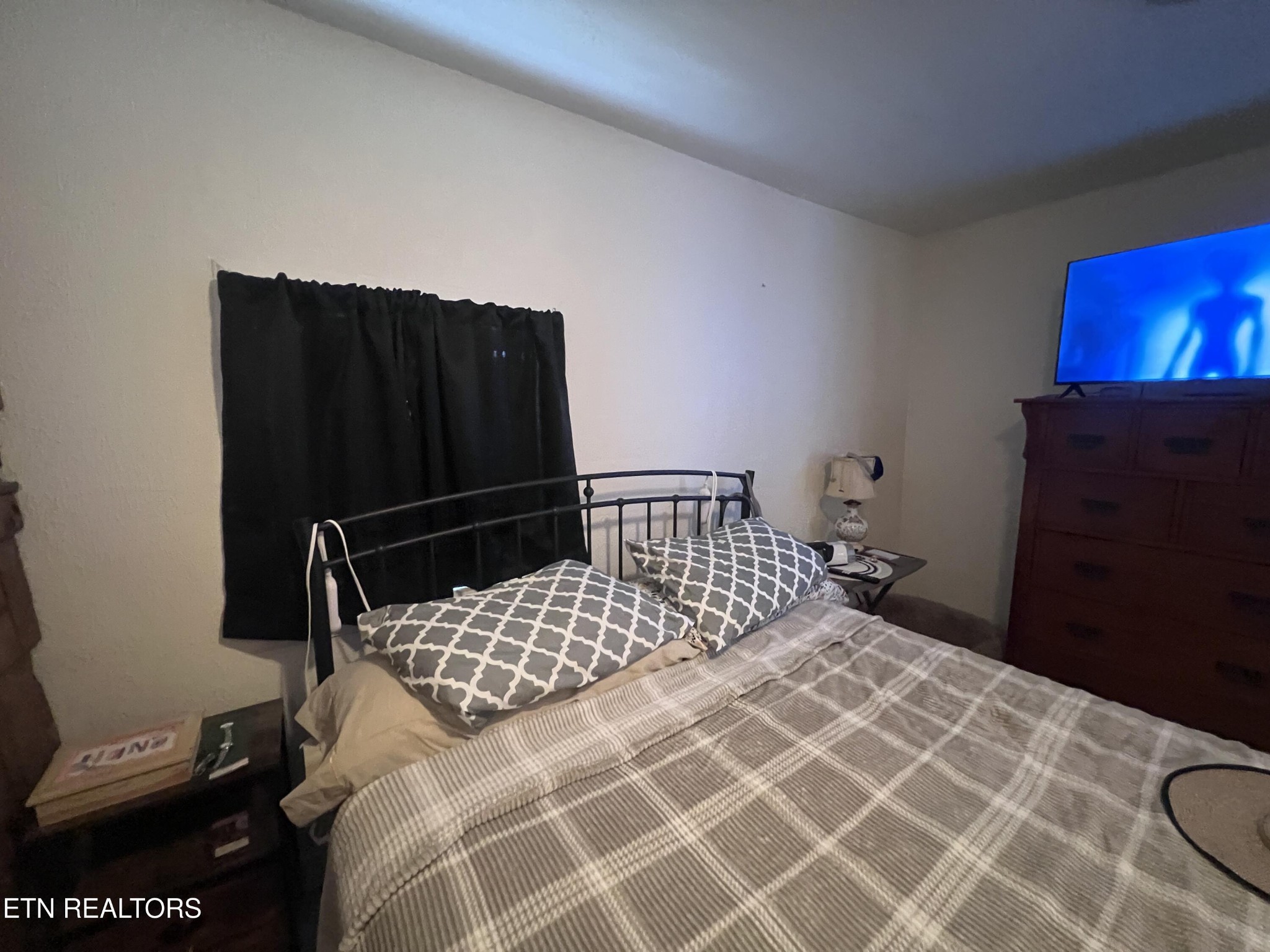 428 Patton Heights Circle Jamestown, TN 38556 - Photo 20 of 29 a bedroom with a bed and a mirror