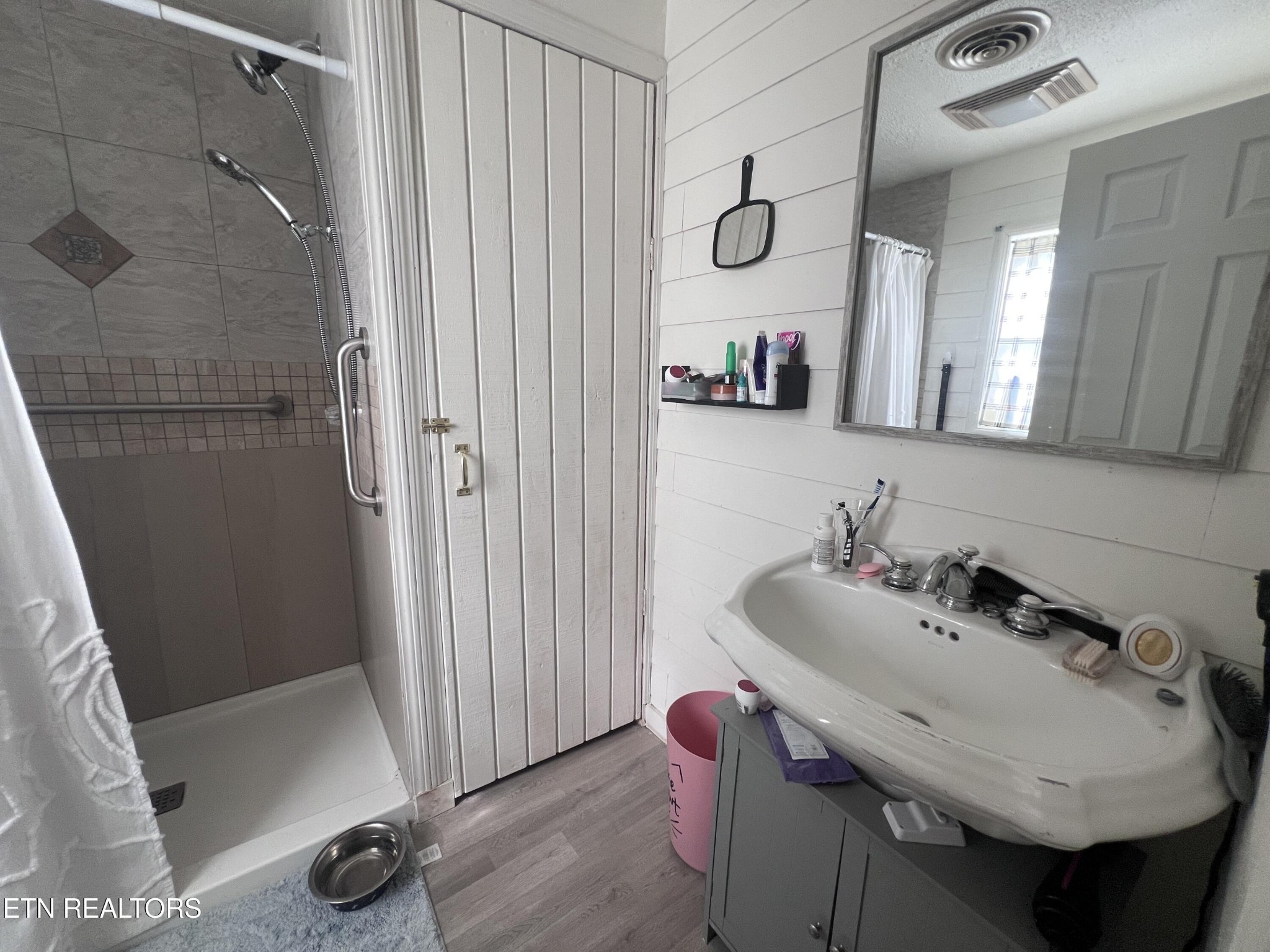 428 Patton Heights Circle Jamestown, TN 38556 - Photo 23 of 29 a bathroom with a sink and a mirror