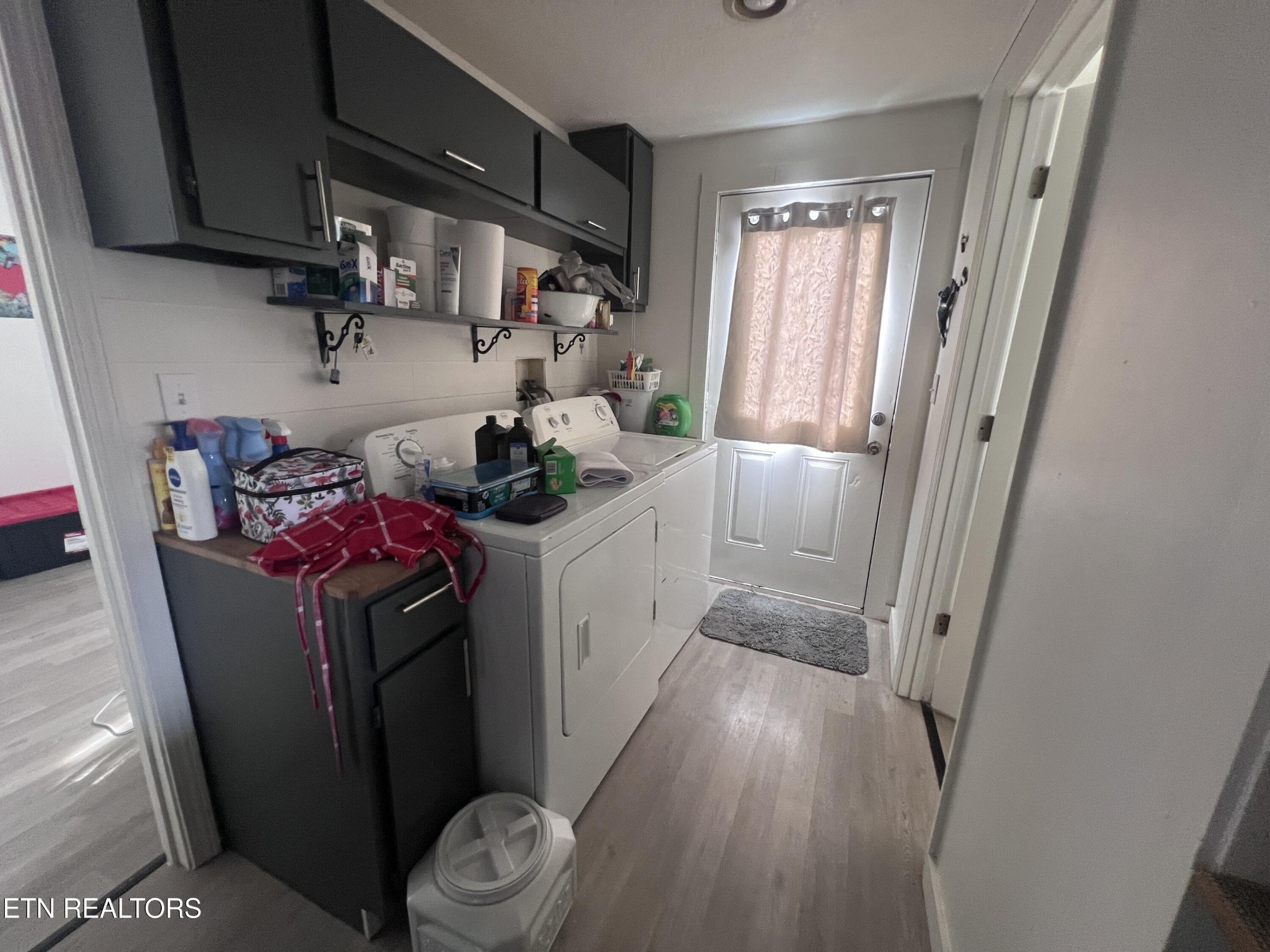 428 Patton Heights Circle Jamestown, TN 38556 - Photo 26 of 29 a utility room with wooden floor washer and dryer