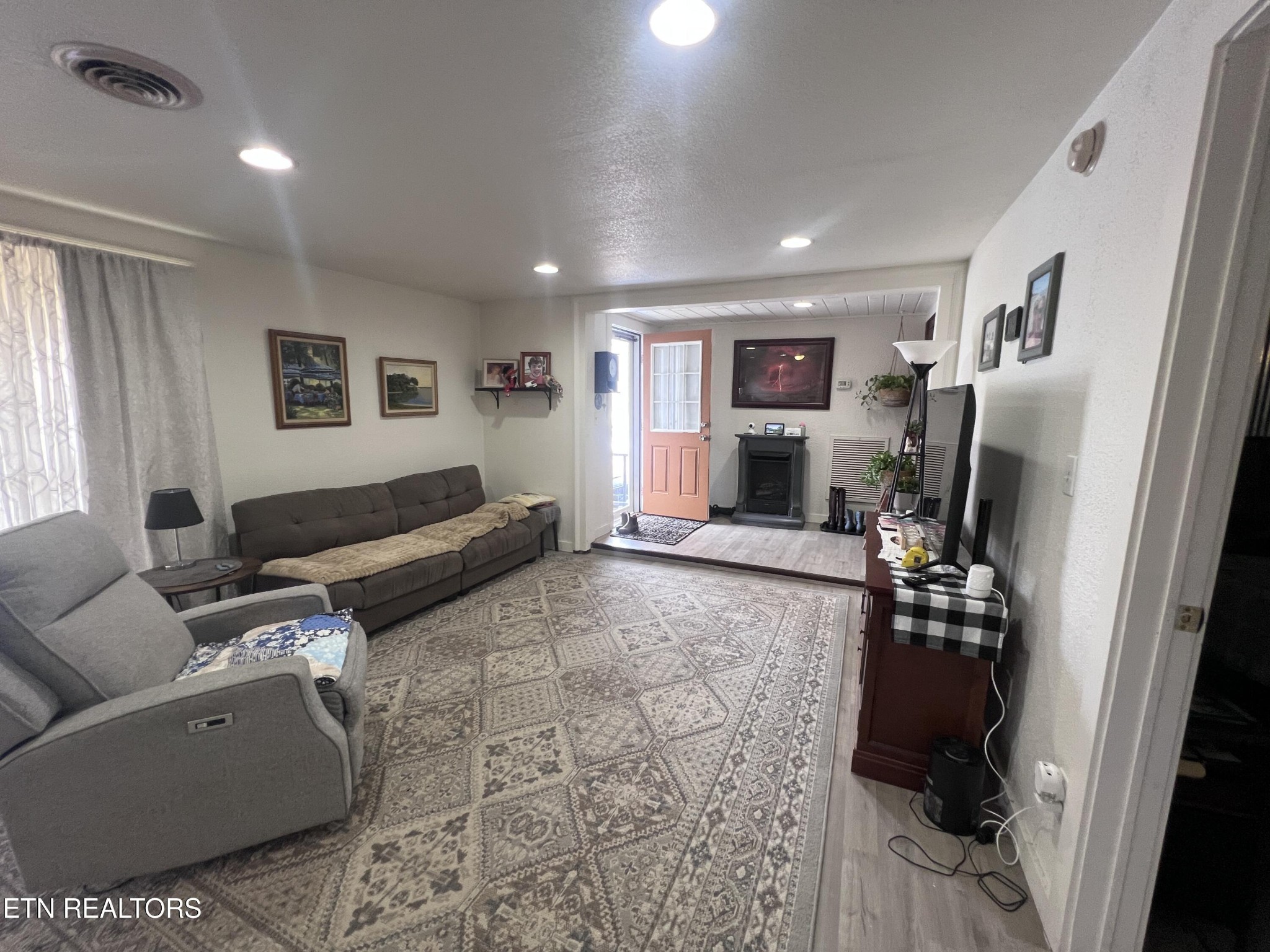 428 Patton Heights Circle Jamestown, TN 38556 - Photo 8 of 29 a living room with furniture and a flat screen tv