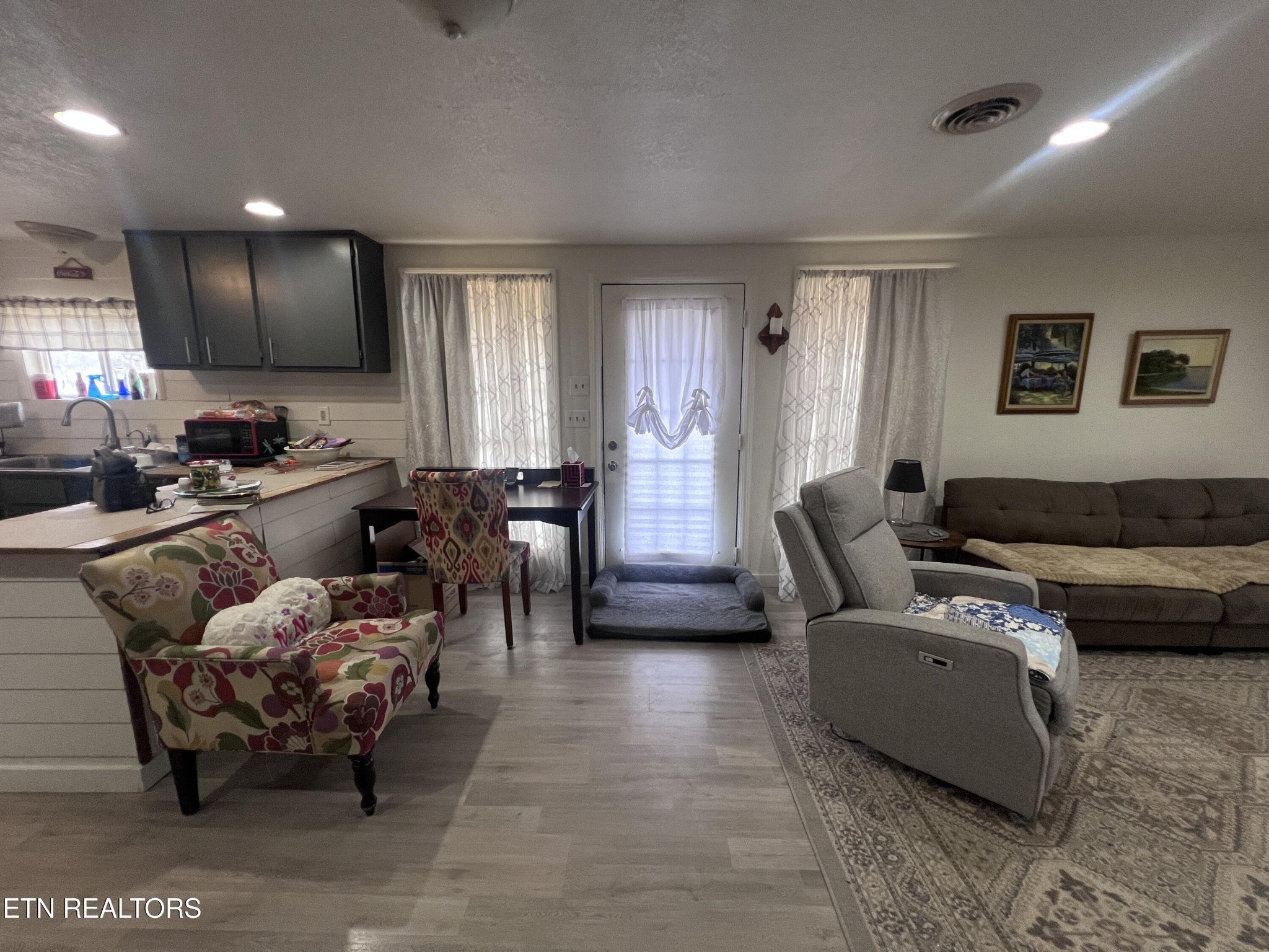 428 Patton Heights Circle Jamestown, TN 38556 - Photo 10 of 29 a living room with furniture and a flat screen tv