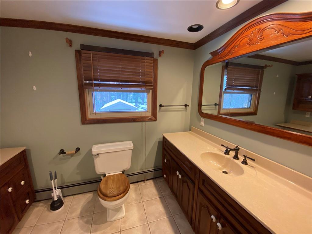 263 Hemlock Springs Road Armagh, PA 15920 - Photo 13 of 25 a bathroom with a sink and a mirror