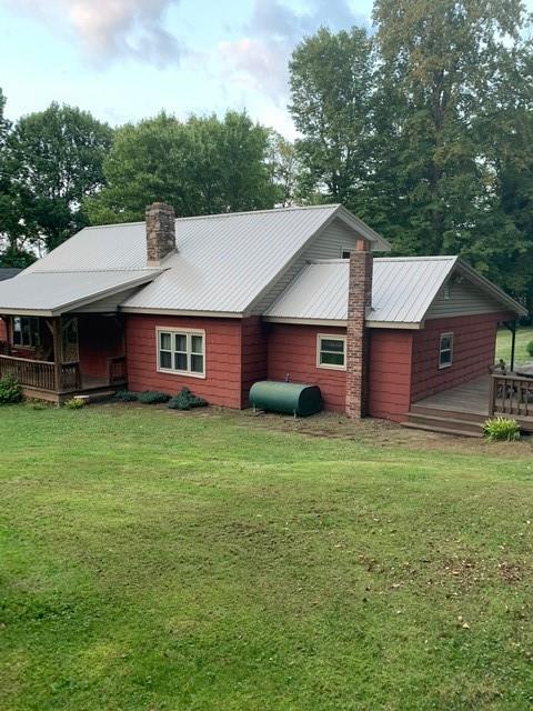 263 Hemlock Springs Road Armagh, PA 15920 - Photo 24 of 25 a front view of a house with a garden