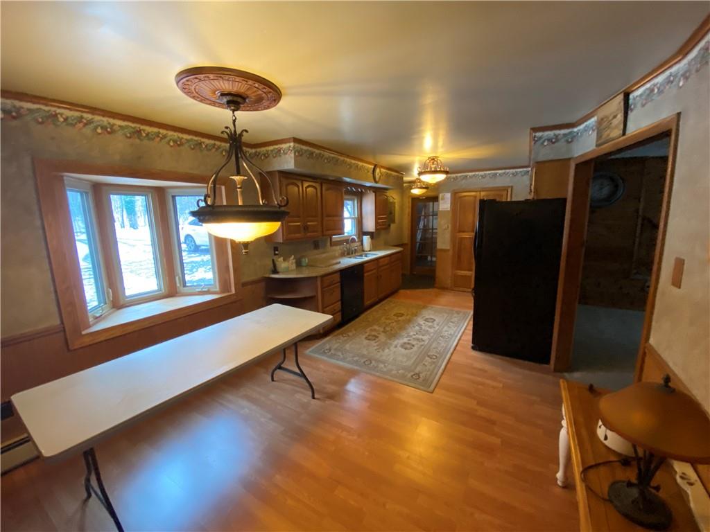 263 Hemlock Springs Road Armagh, PA 15920 - Photo 4 of 25 a room with wooden floor and furniture