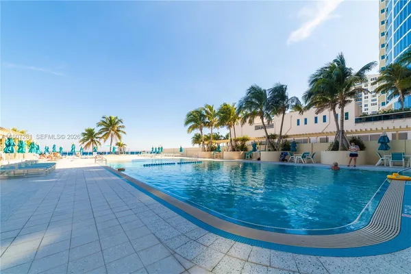a view of a swimming pool with an outdoor space