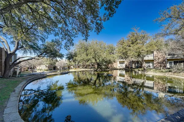 a view of a lake with houses