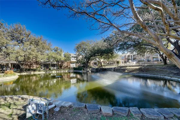 a view of a lake with houses