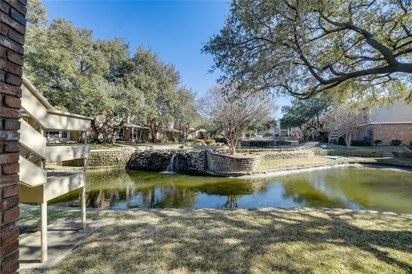 a view of a lake with houses