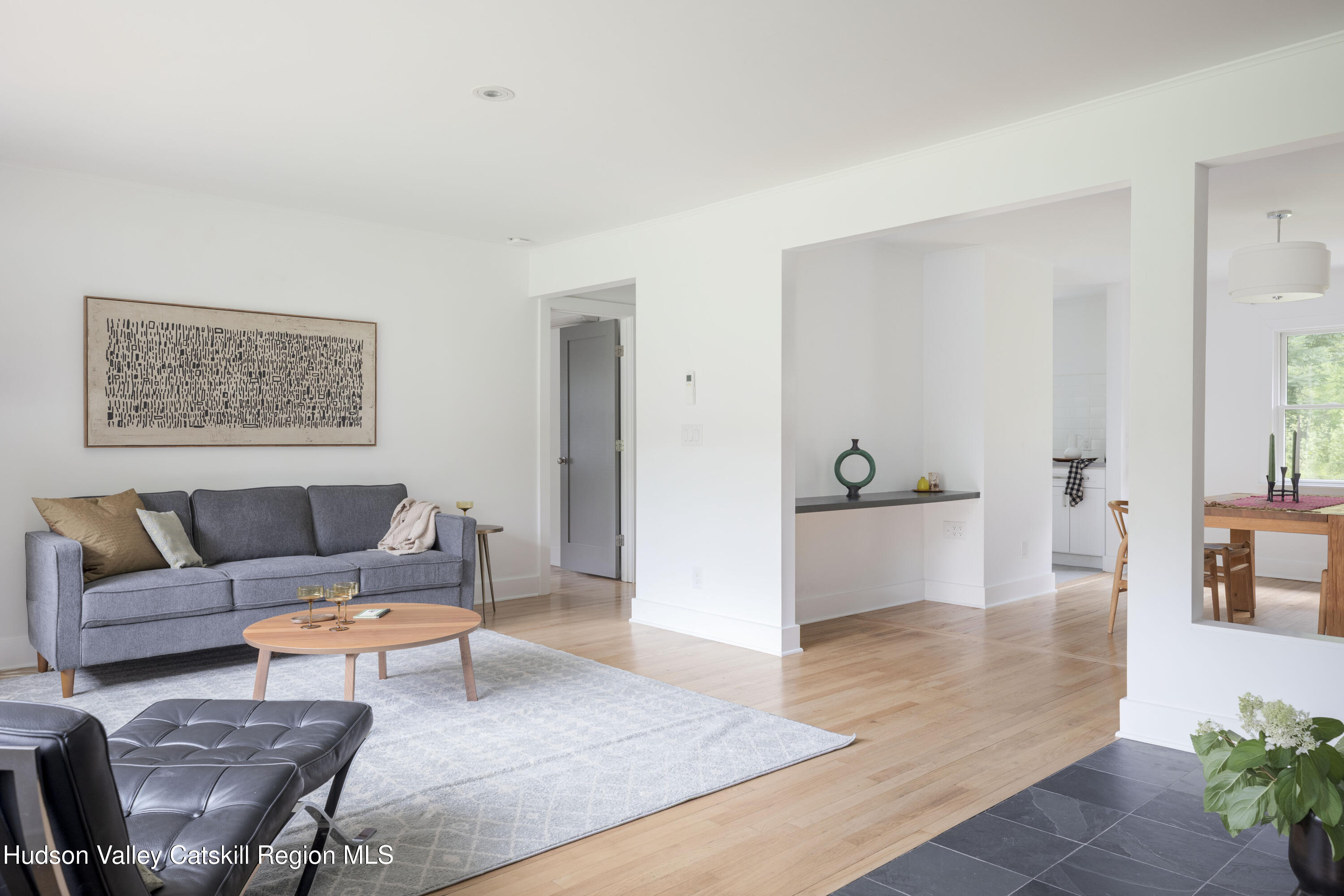 292 County Rte 27B Hudson, NY 12534 - Photo 11 of 40 a living room with furniture and wooden floor