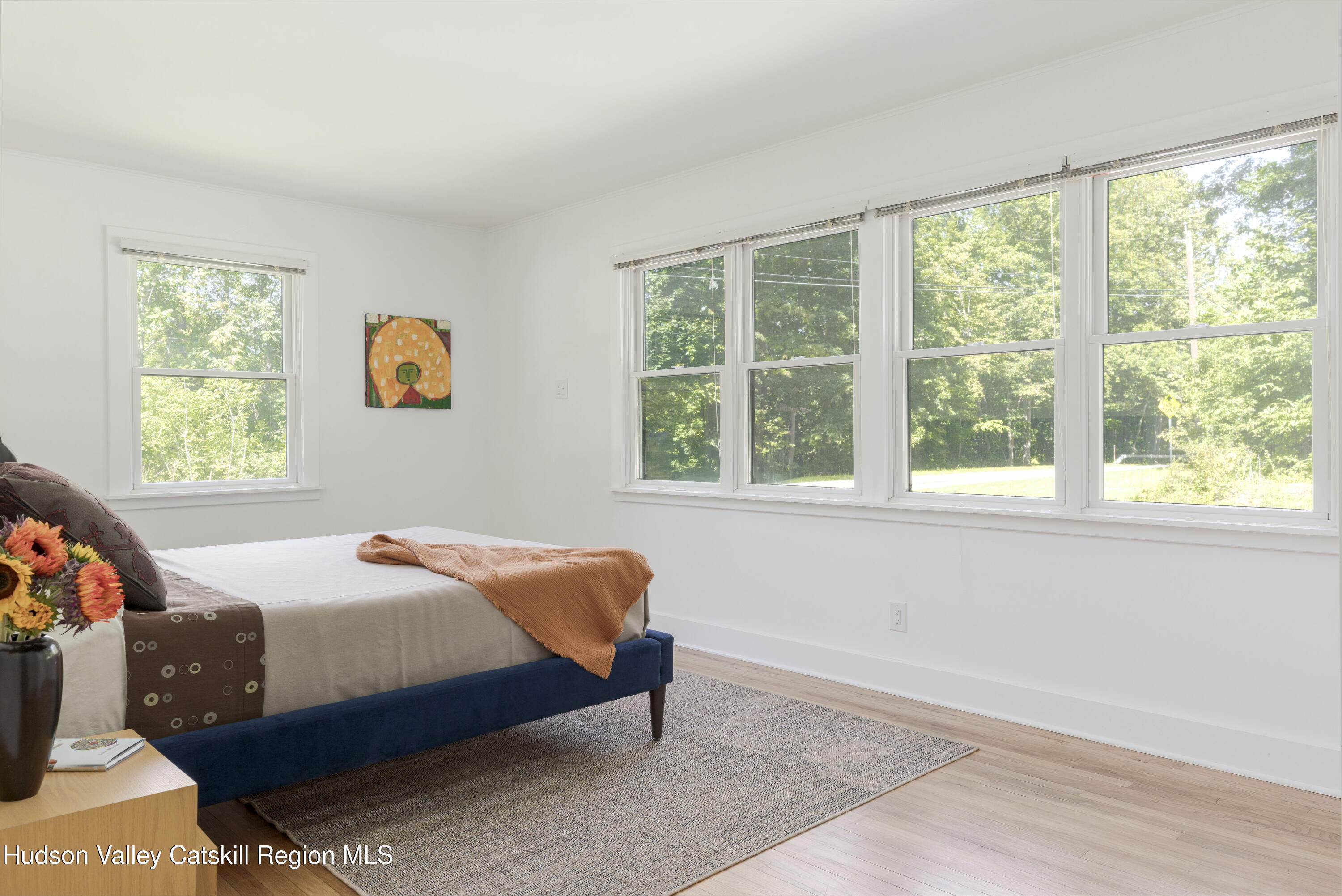 292 County Rte 27B Hudson, NY 12534 - Photo 19 of 40 a bedroom with a bed and a window