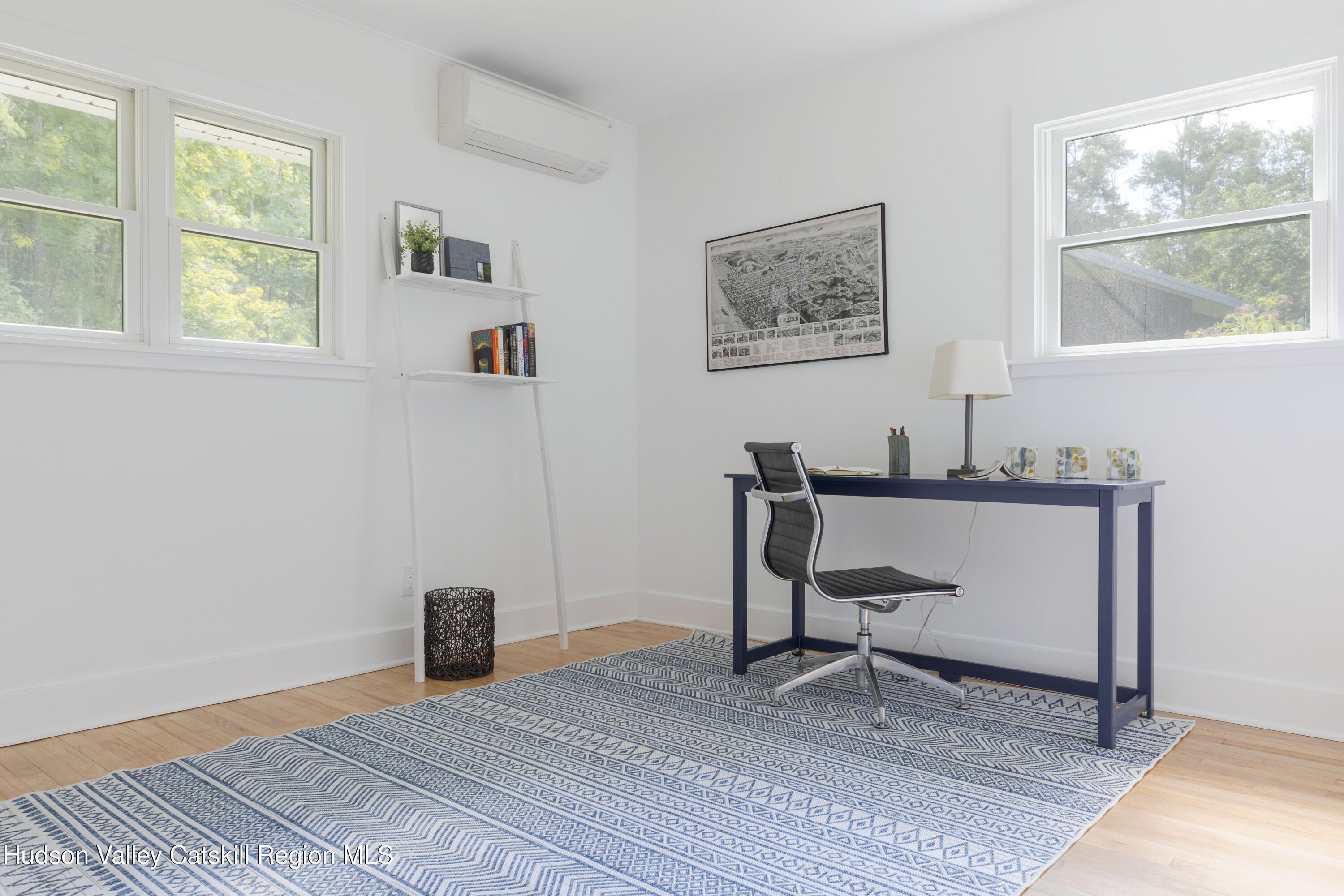 292 County Rte 27B Hudson, NY 12534 - Photo 20 of 40 a view of a workspace with furniture and a window