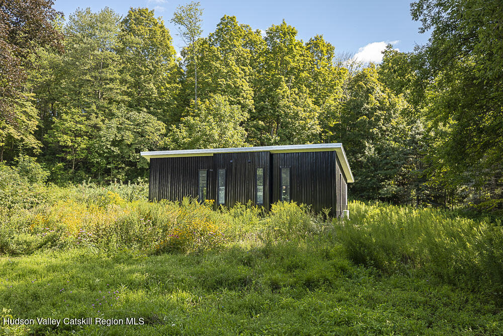 292 County Rte 27B Hudson, NY 12534 - Photo 24 of 40 a backyard of a house with lots of green space