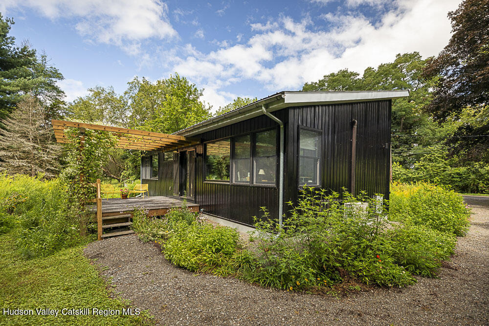 292 County Rte 27B Hudson, NY 12534 - Photo 5 of 40 a view of a house with backyard and garden