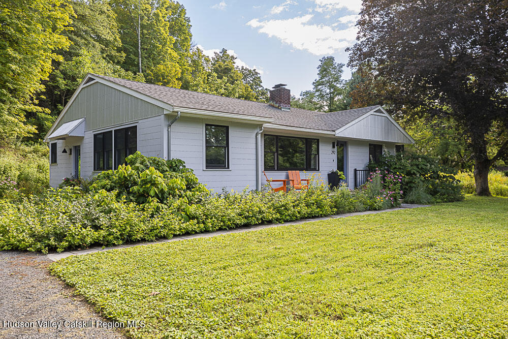 292 County Rte 27B Hudson, NY 12534 - Photo 7 of 40 a front view of house with yard and green space