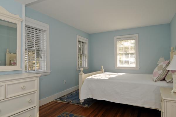 20 Piney Road Cotuit, MA 02635 - Photo 7 of 9 a bedroom with a bed and a window