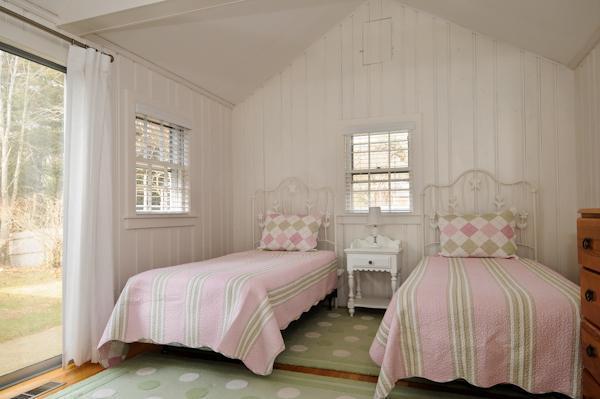 20 Piney Road Cotuit, MA 02635 - Photo 8 of 9 a bedroom with a bed and a window