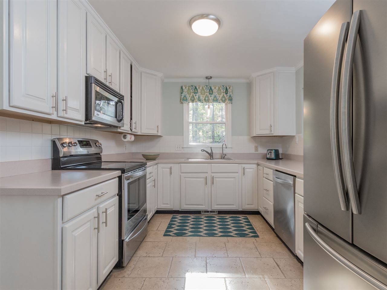 8113 Kingsland Drive Raleigh, NC 27613 - Photo 9 of 25 Kitchen