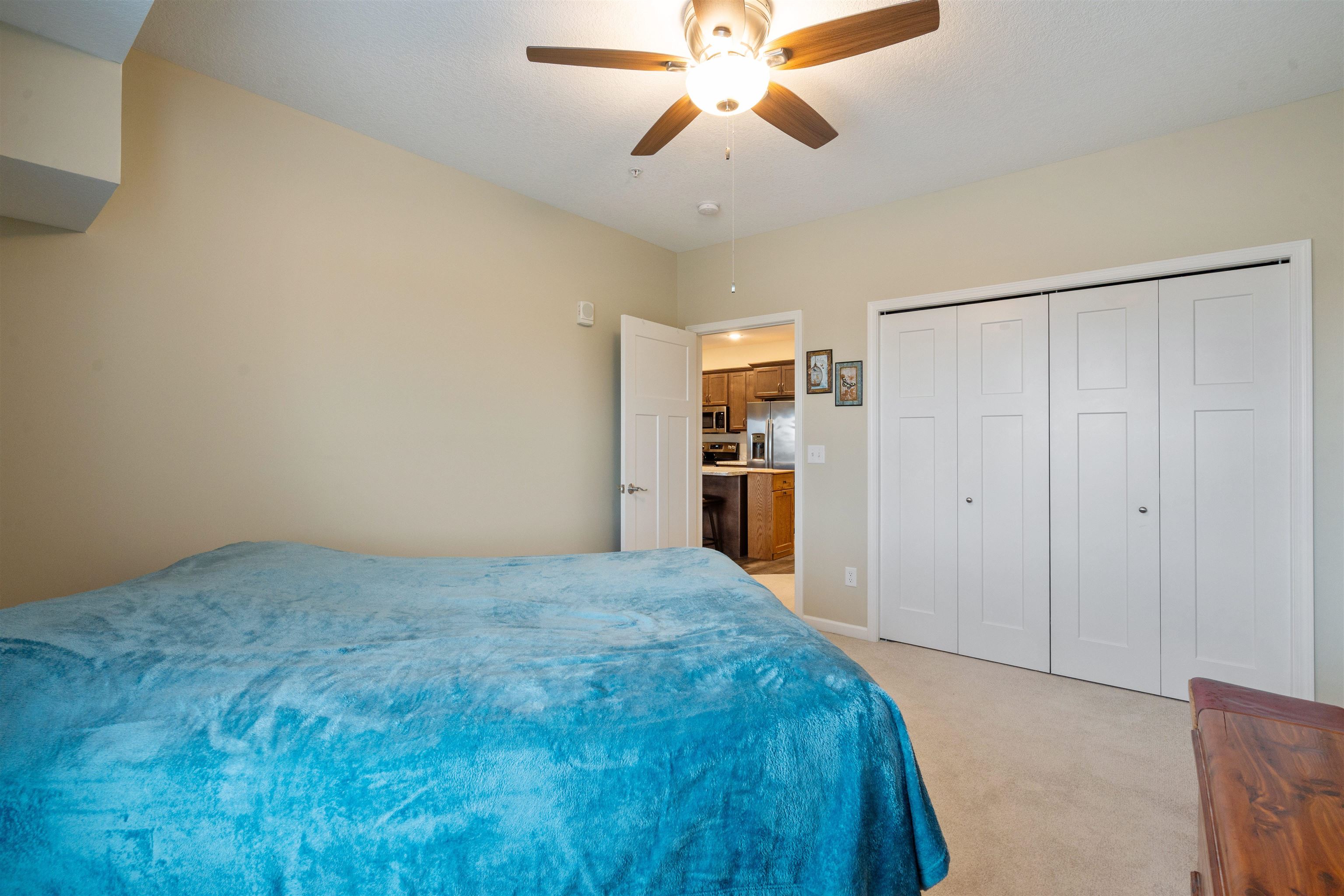 2592 Middle Road, Unit 208 Bettendorf, IA 52722 - Photo 13 of 19 a view of empty room with wooden floor