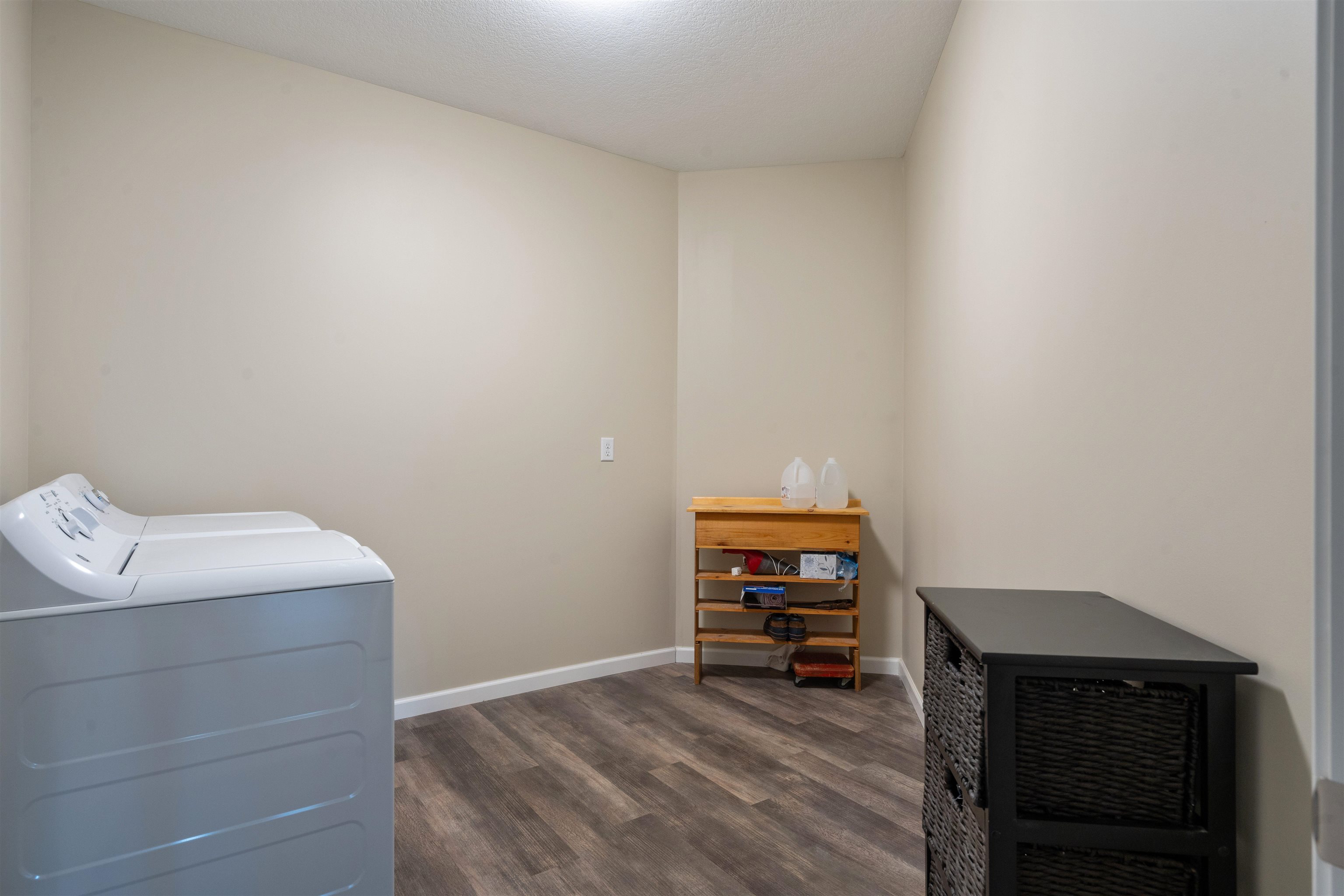 2592 Middle Road, Unit 208 Bettendorf, IA 52722 - Photo 16 of 19 a view of room with clothes and shoes