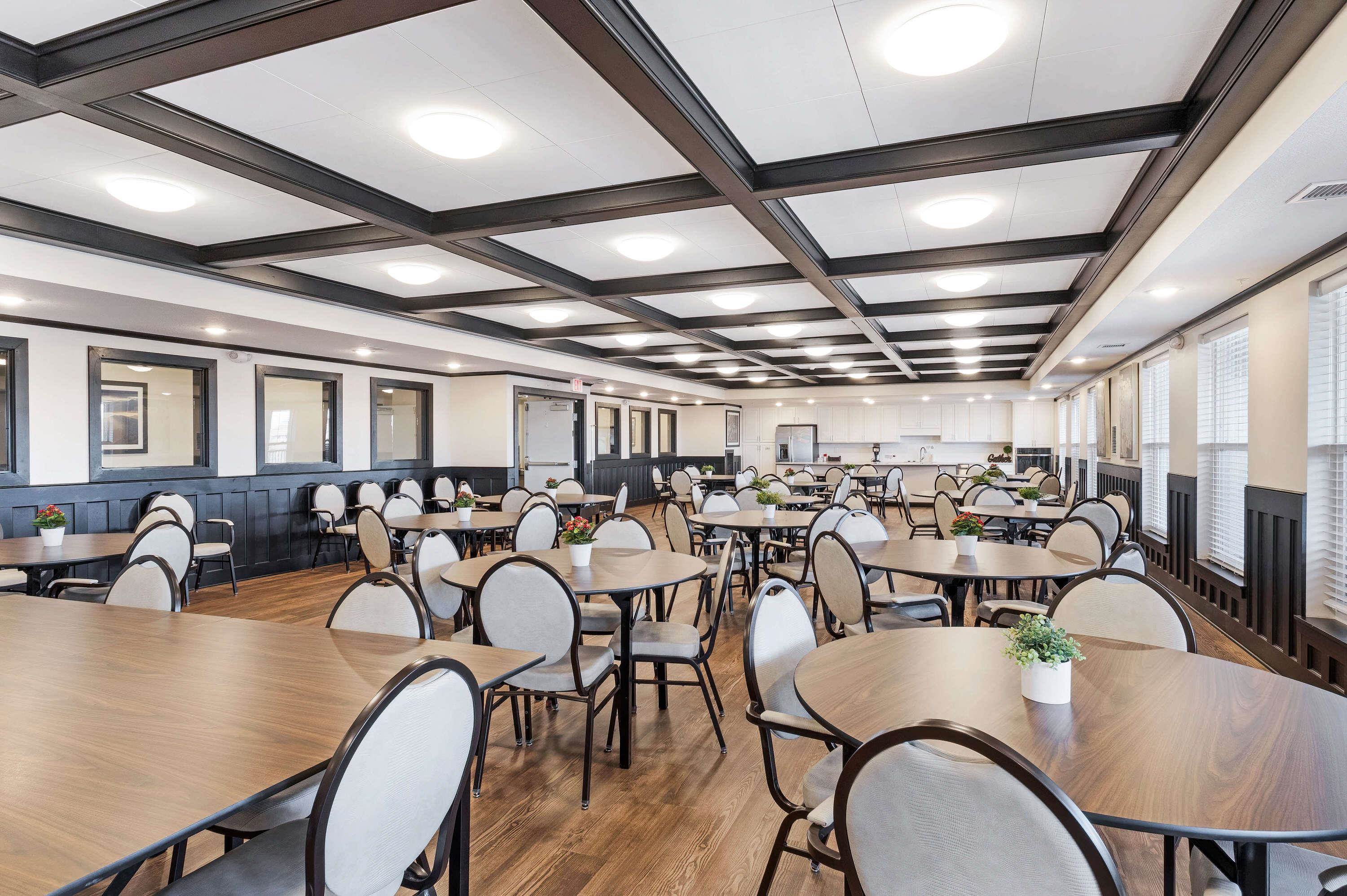 2592 Middle Road, Unit 208 Bettendorf, IA 52722 - Photo 19 of 19 a very nice looking dining room with lots of furniture and wooden floor