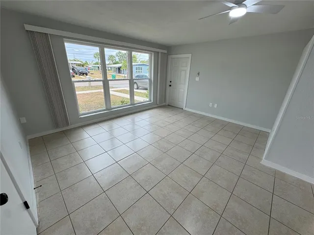 an empty room with windows