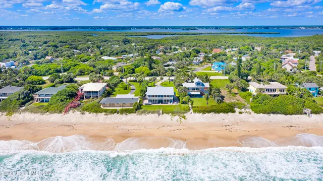 a view of kitchen with granite countertop window