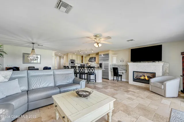 a view of entryway with wooden floor and fence