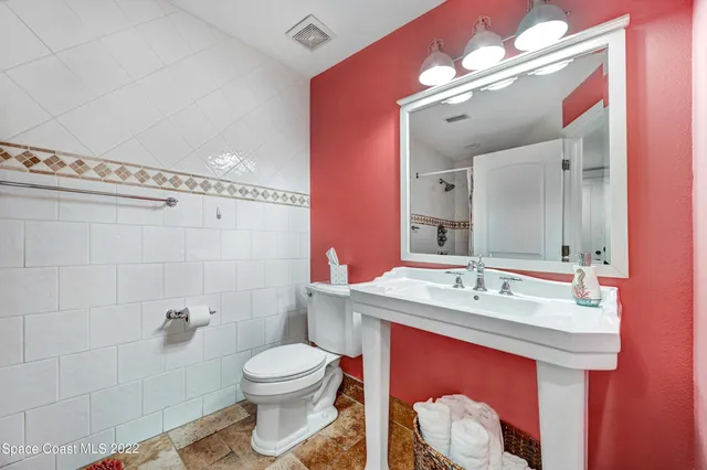 a kitchen with kitchen island a sink counter space and appliances