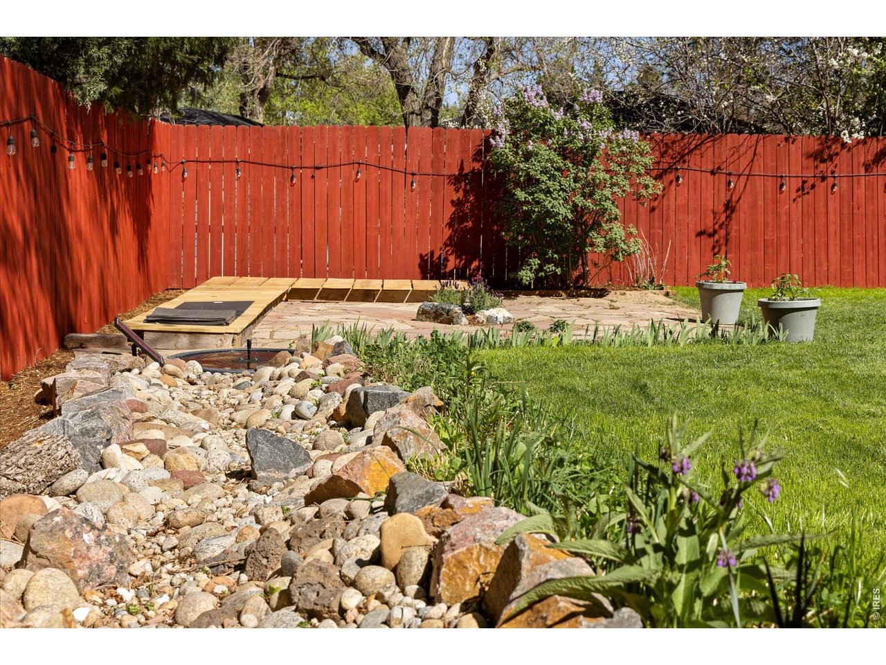 340 28th Street Boulder, CO 80305 - Photo 26 of 40 Custom pebble creek with water feature