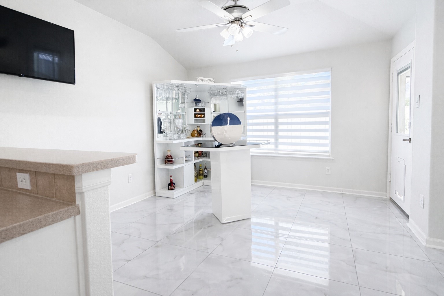 24534 Forest Path Court Spring, TX 77373 - Photo 19 of 43 a living room with furniture and a flat screen tv