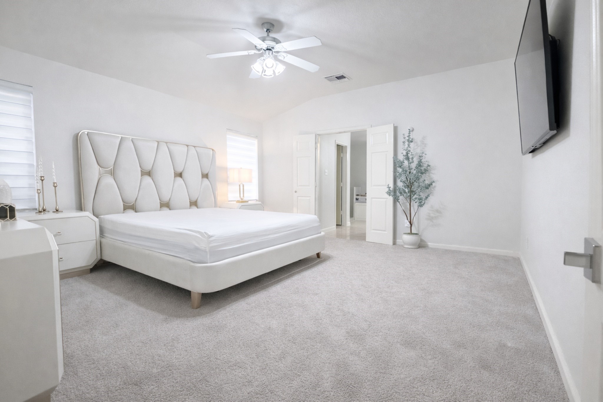 24534 Forest Path Court Spring, TX 77373 - Photo 20 of 43 a bedroom with a bed couch and a window