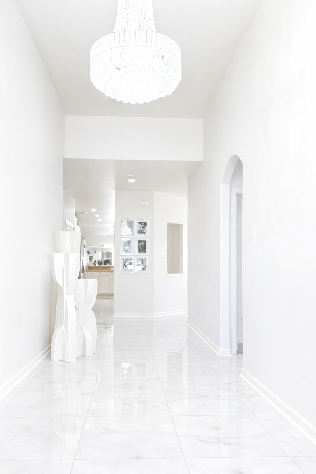 24534 Forest Path Court Spring, TX 77373 - Photo 7 of 43 a view of a living room with a white kitchen