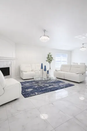 a kitchen with white cabinets and a sink