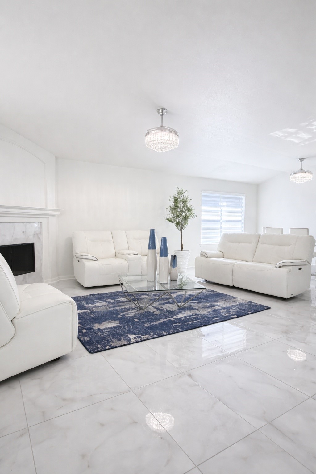 24534 Forest Path Court Spring, TX 77373 - Photo 10 of 43 a living room with furniture and a chandelier