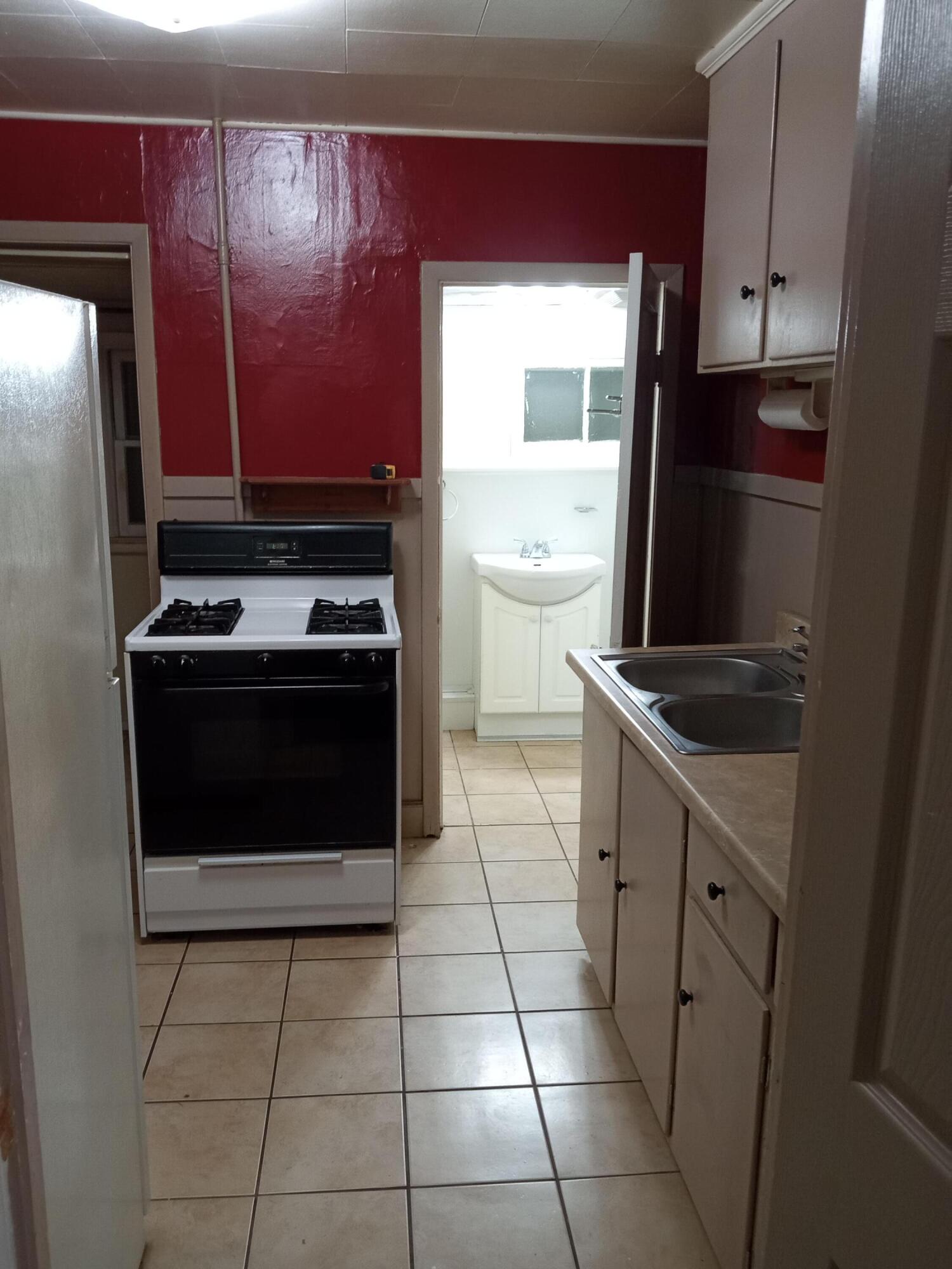 611 Croswell Street Adrian, MI 49221 - Photo 5 of 8 View looking from Bedroom into Kitchen