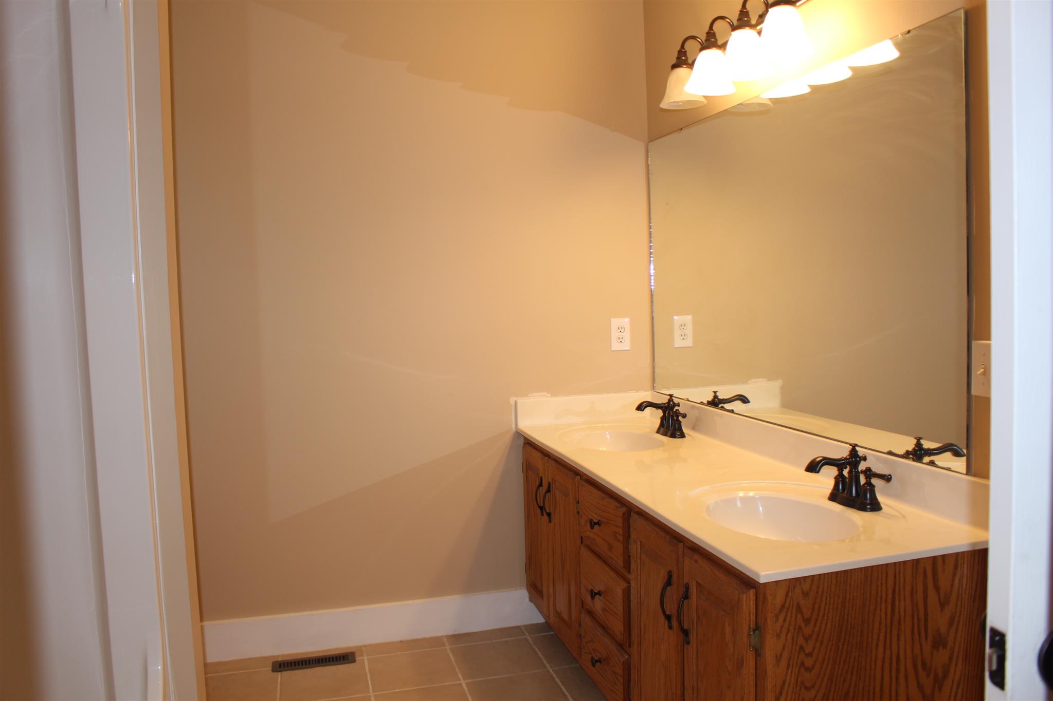 425 Brandon Road Manchester, TN 37355 - Photo 14 of 25 a bathroom with a sink and a mirror