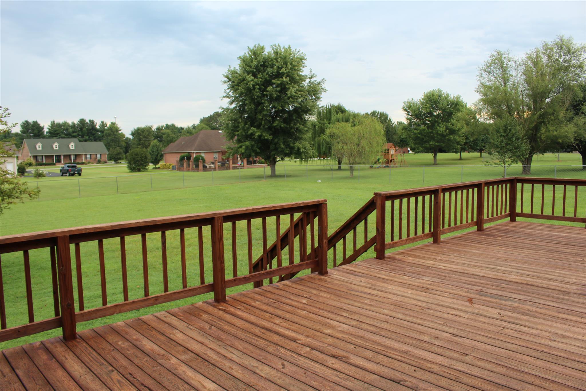 425 Brandon Road Manchester, TN 37355 - Photo 21 of 25 a view of balcony with wooden floor and fence