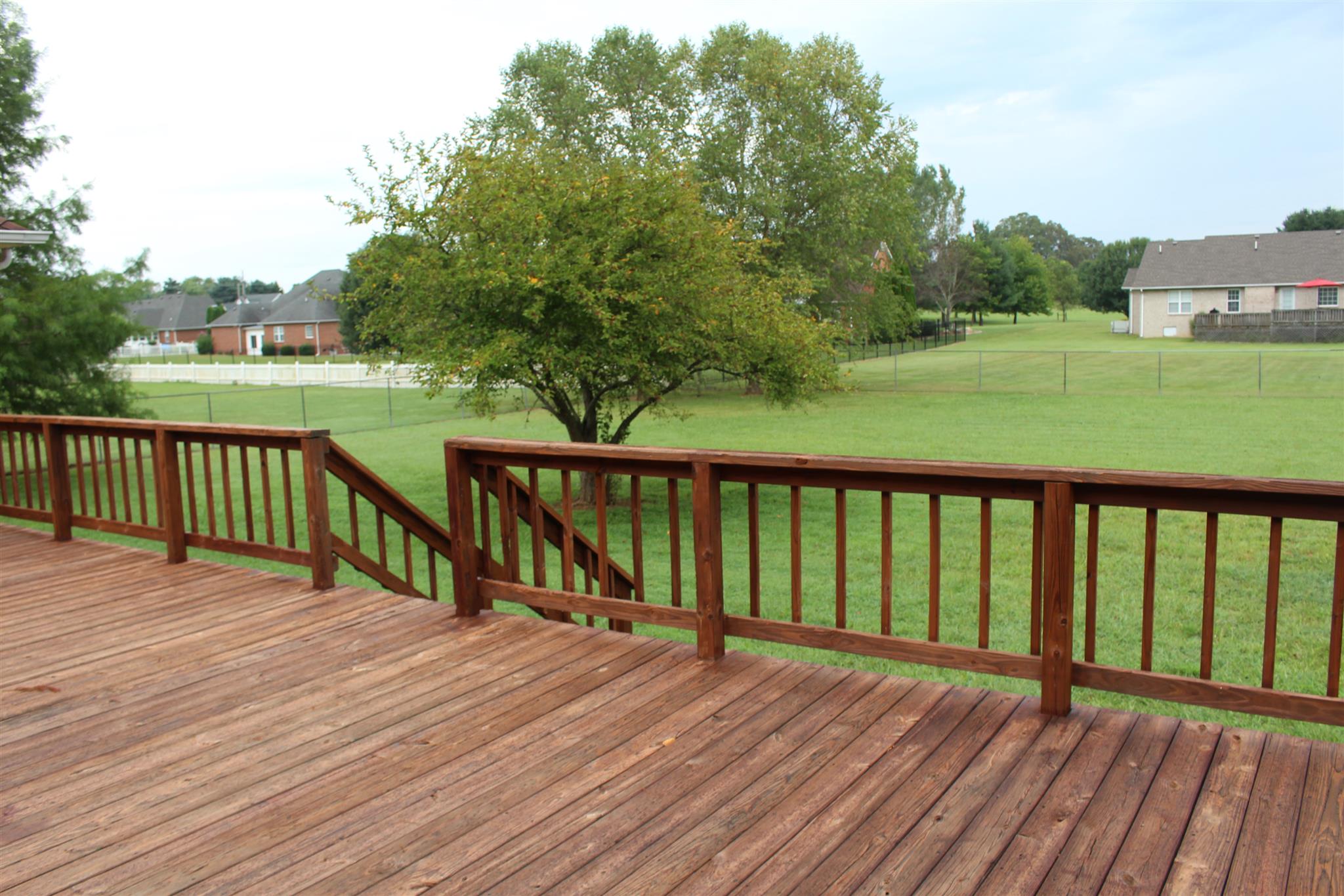 425 Brandon Road Manchester, TN 37355 - Photo 23 of 25 a view of wooden deck and a garden
