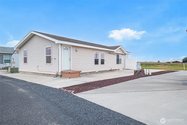 a view of a house with a swimming pool