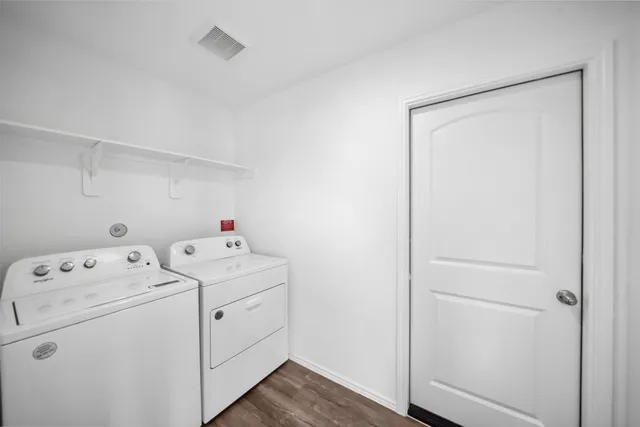a view of storage room with washer and dryer