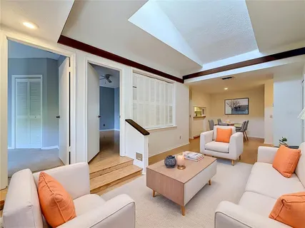 a living room with furniture and a couch