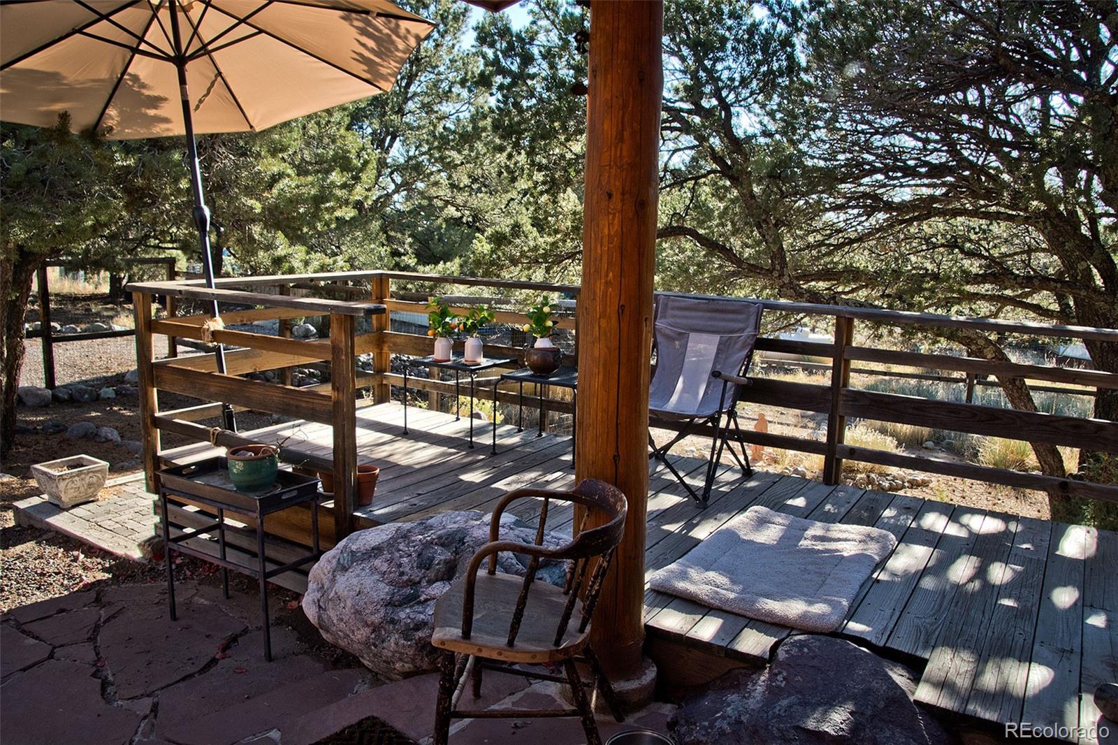 109 Pinewood Overlook Crestone, CO 81131 - Photo 28 of 35 a view of a chairs and table in the patio