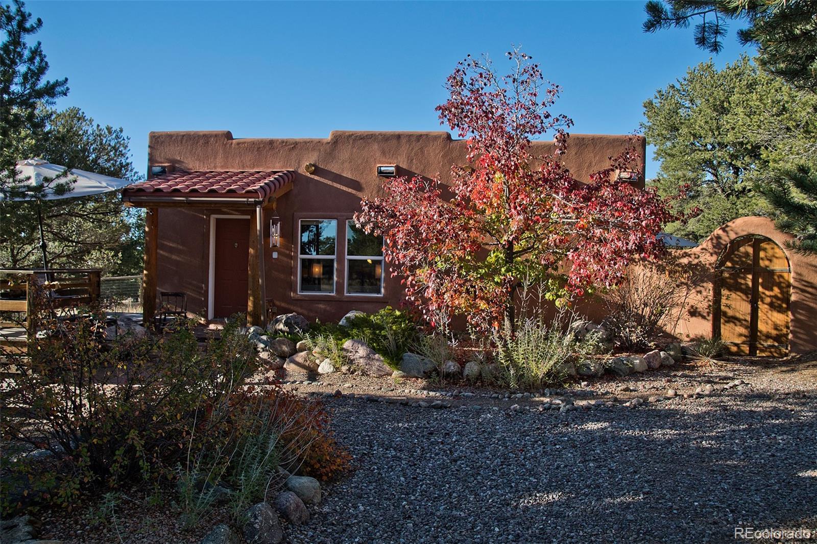 109 Pinewood Overlook Crestone, CO 81131 - Photo 29 of 35 a view of a house with a yard