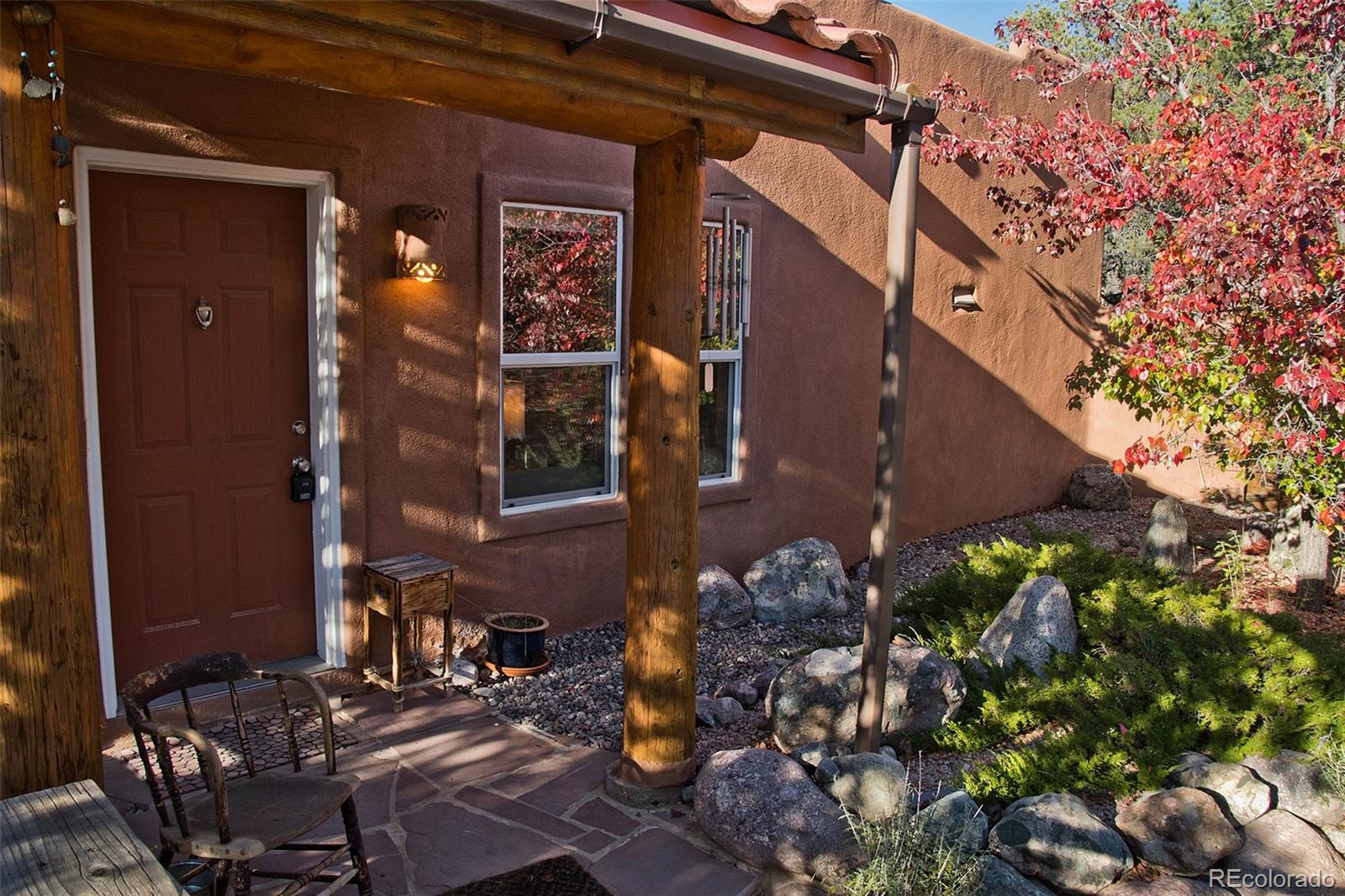 109 Pinewood Overlook Crestone, CO 81131 - Photo 3 of 35 front view of a house with a tree