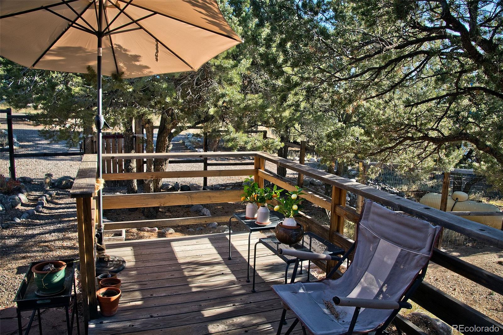 109 Pinewood Overlook Crestone, CO 81131 - Photo 5 of 35 a view of an outdoor sitting area with wooden fence